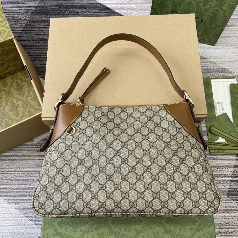 G*u*i top handle bags